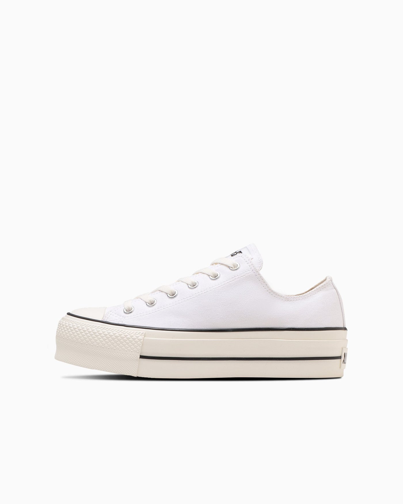 White thick-soled sneakers