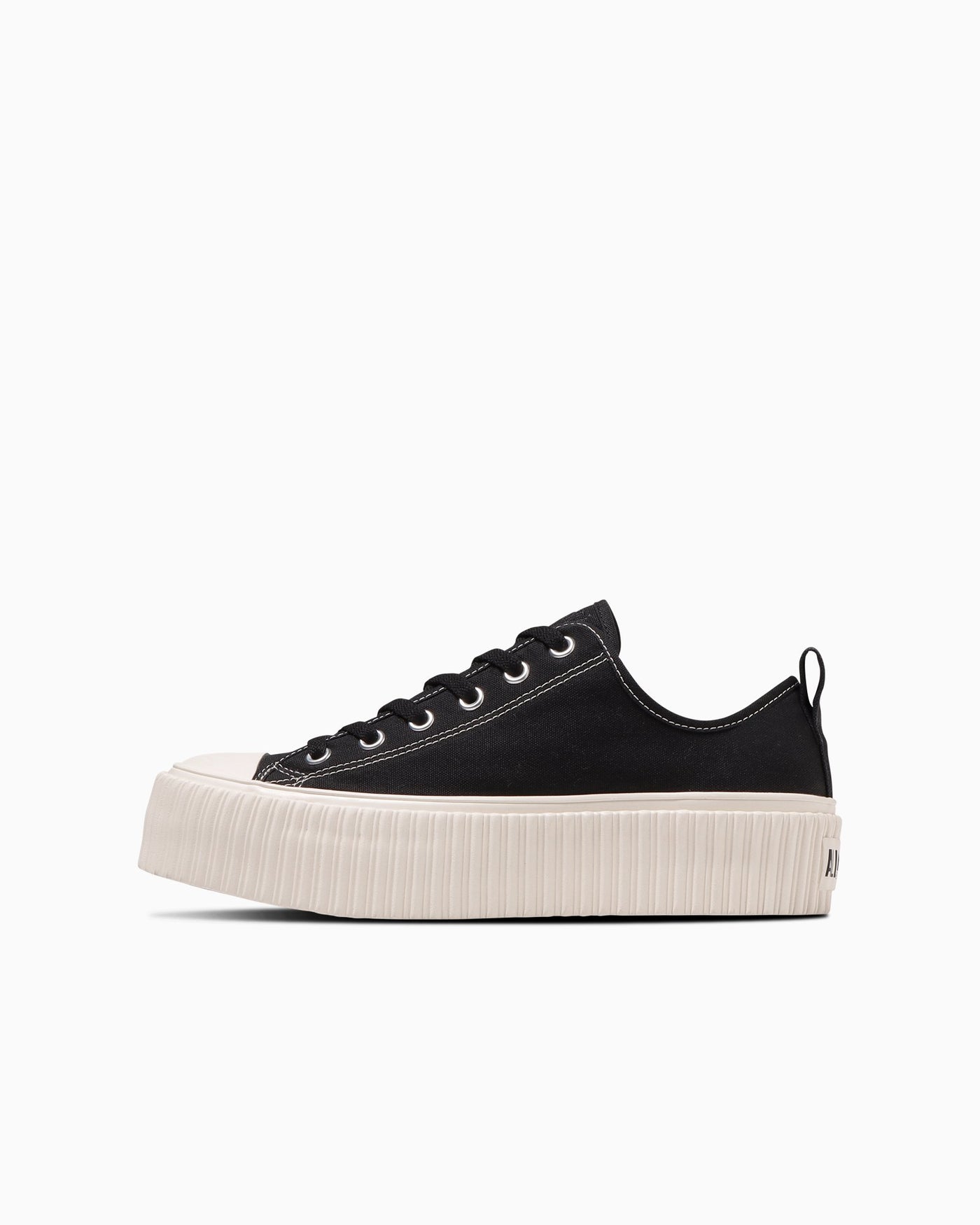 Black thick-soled sneakers