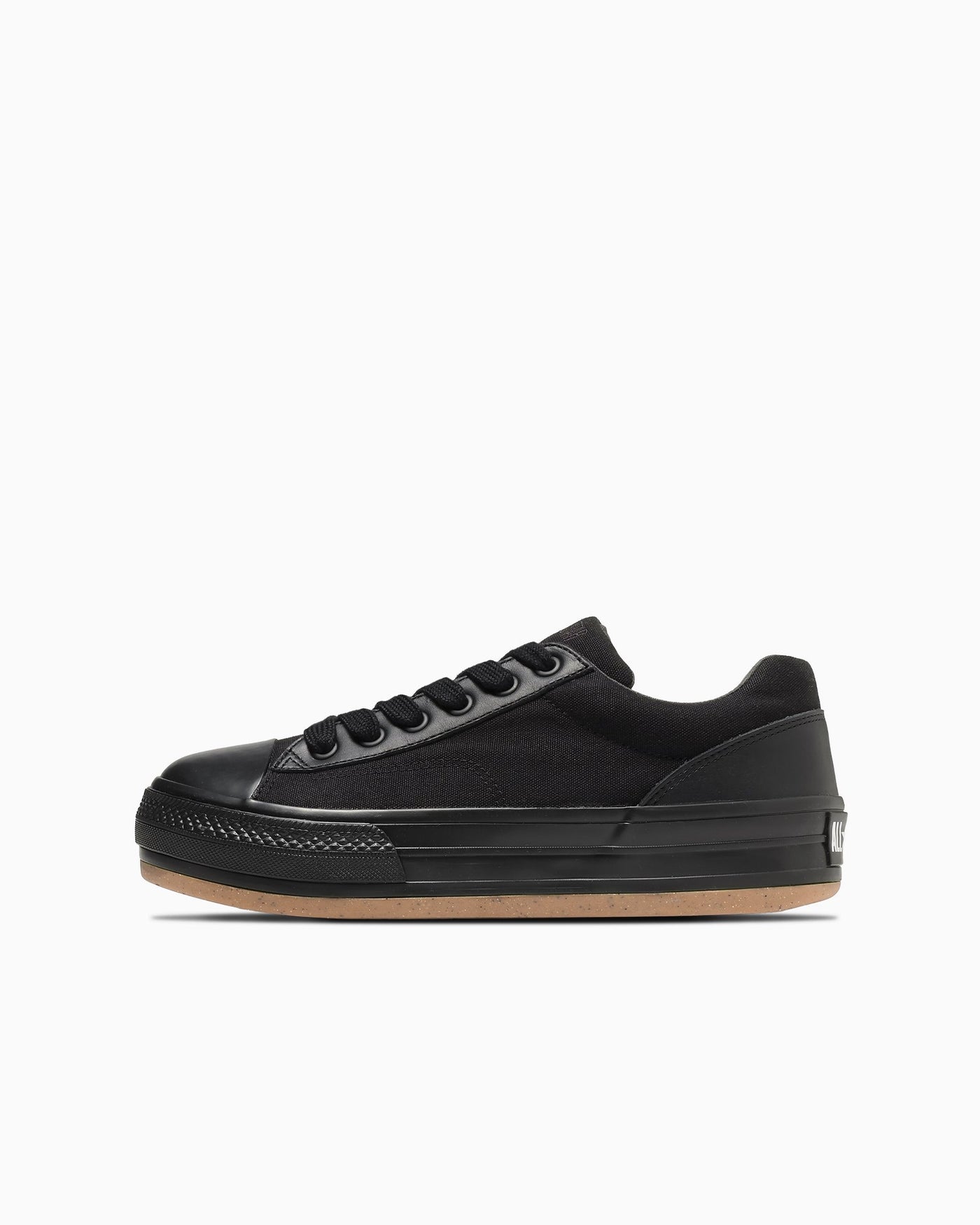 Black thick-soled sneakers