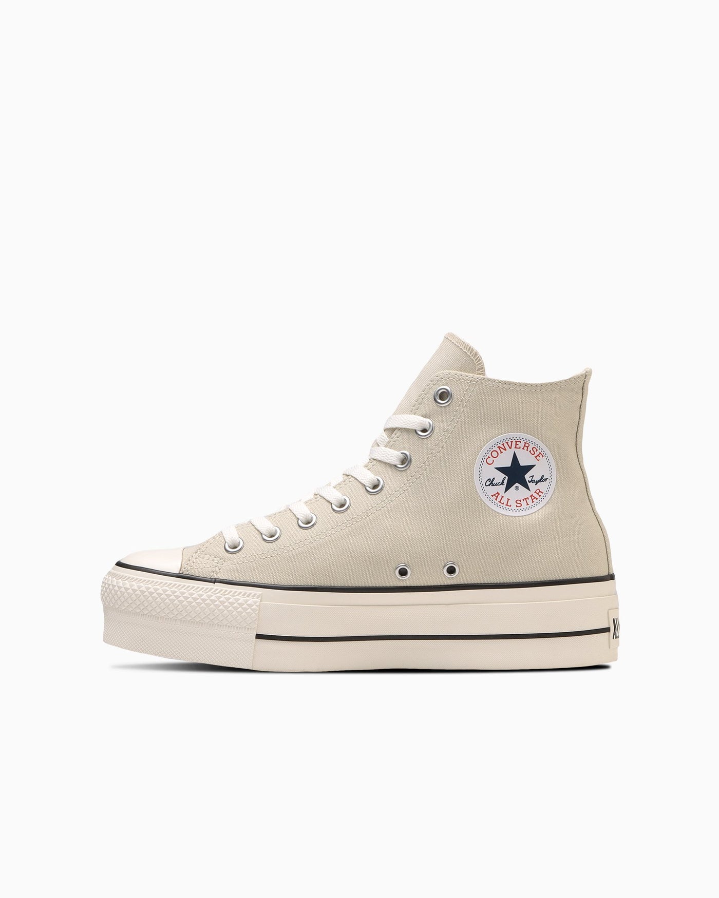 White cream-colored thick-soled sneakers