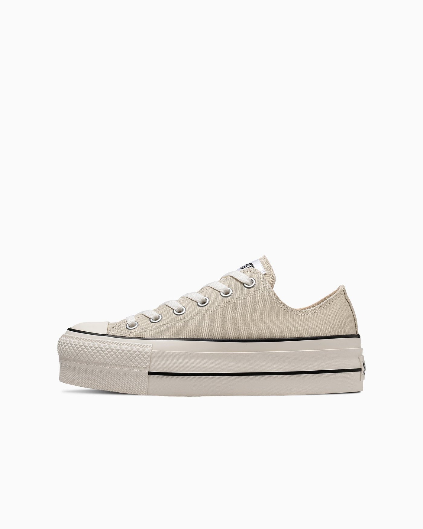 White cream-colored thick-soled sneakers